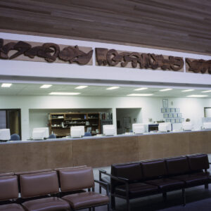 Three carved teak and minyak wood panels. Each panel is rectangular with abstract shapes arranged horizontally.
