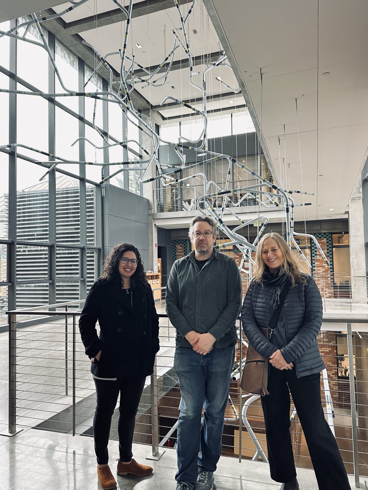 2024, Rob Ley (center) stands with Martina Oxoby (left) and Peg Butler ...
